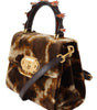 Dolce & Gabbana Elegant Giraffe Pattern Welcome Bag with Gold Accents