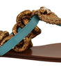 Chaussures plates gladiateur chic Dolce & Gabbana avec détail cœur dévotionnel