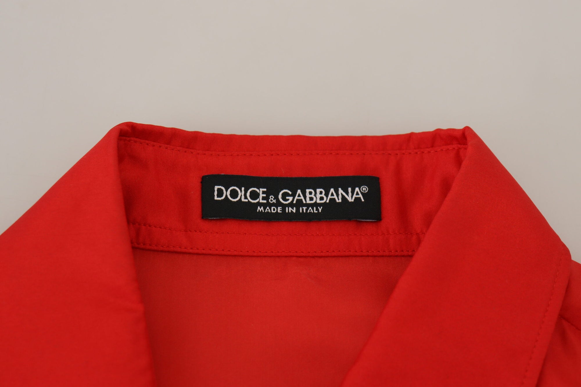 Polo élégant à manches longues et col en soie Dolce & Gabbana