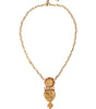 Collier Dolce & Gabbana en laiton doré avec pendentif en cristal rose Sacré-Cœur