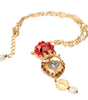 Collier Dolce & Gabbana en laiton doré avec pendentif en cristal rose Sacré-Cœur