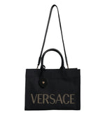 Sac fourre-tout à bandoulière en toile et cuir noir avec logo Versace