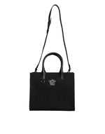 Sac fourre-tout à bandoulière en toile et cuir noir avec logo Versace