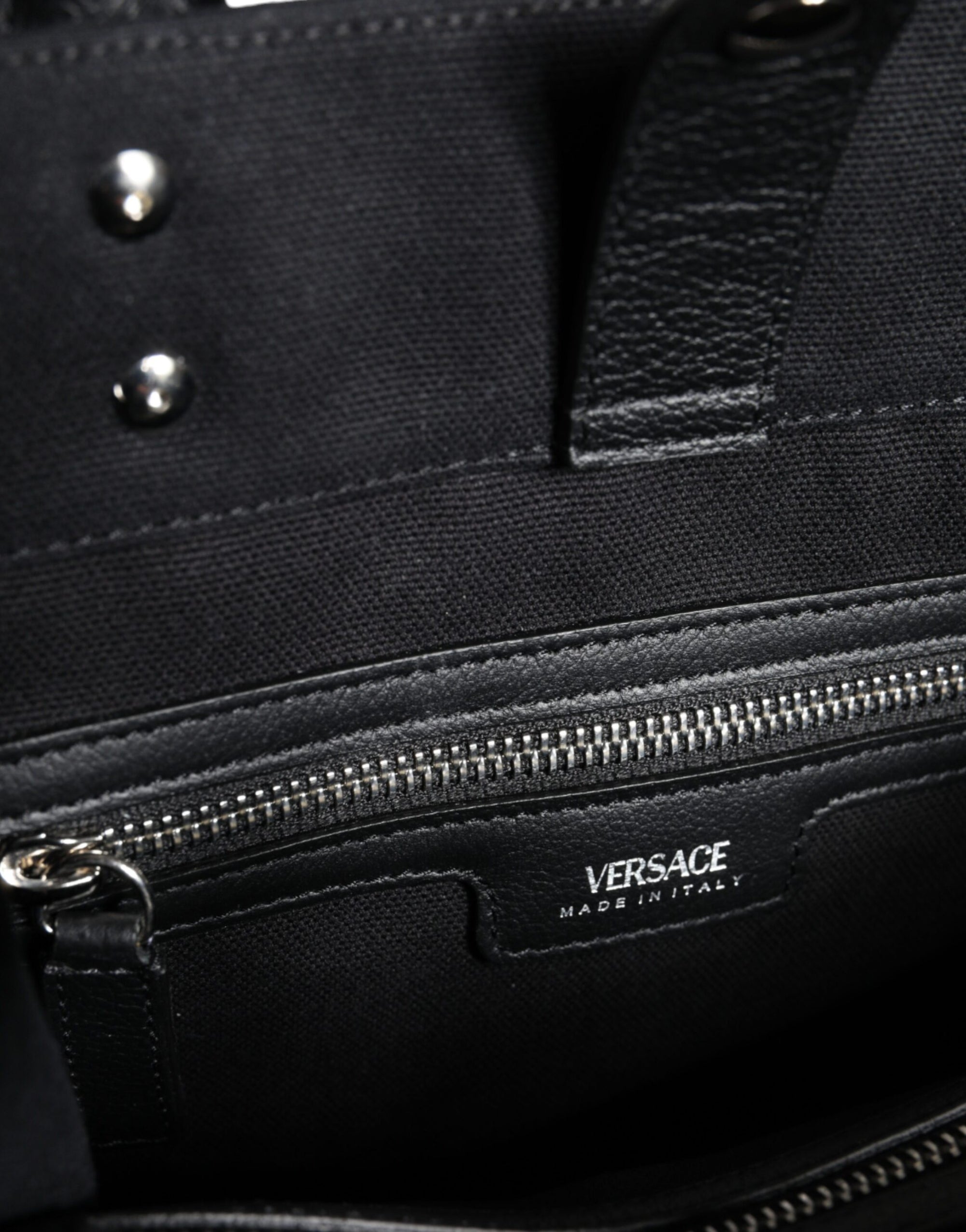 Sac fourre-tout à bandoulière en toile et cuir noir avec logo Versace