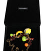 Collier Dolce & Gabbana avec pendentifs en laiton doré et logo en cristal et fleurs