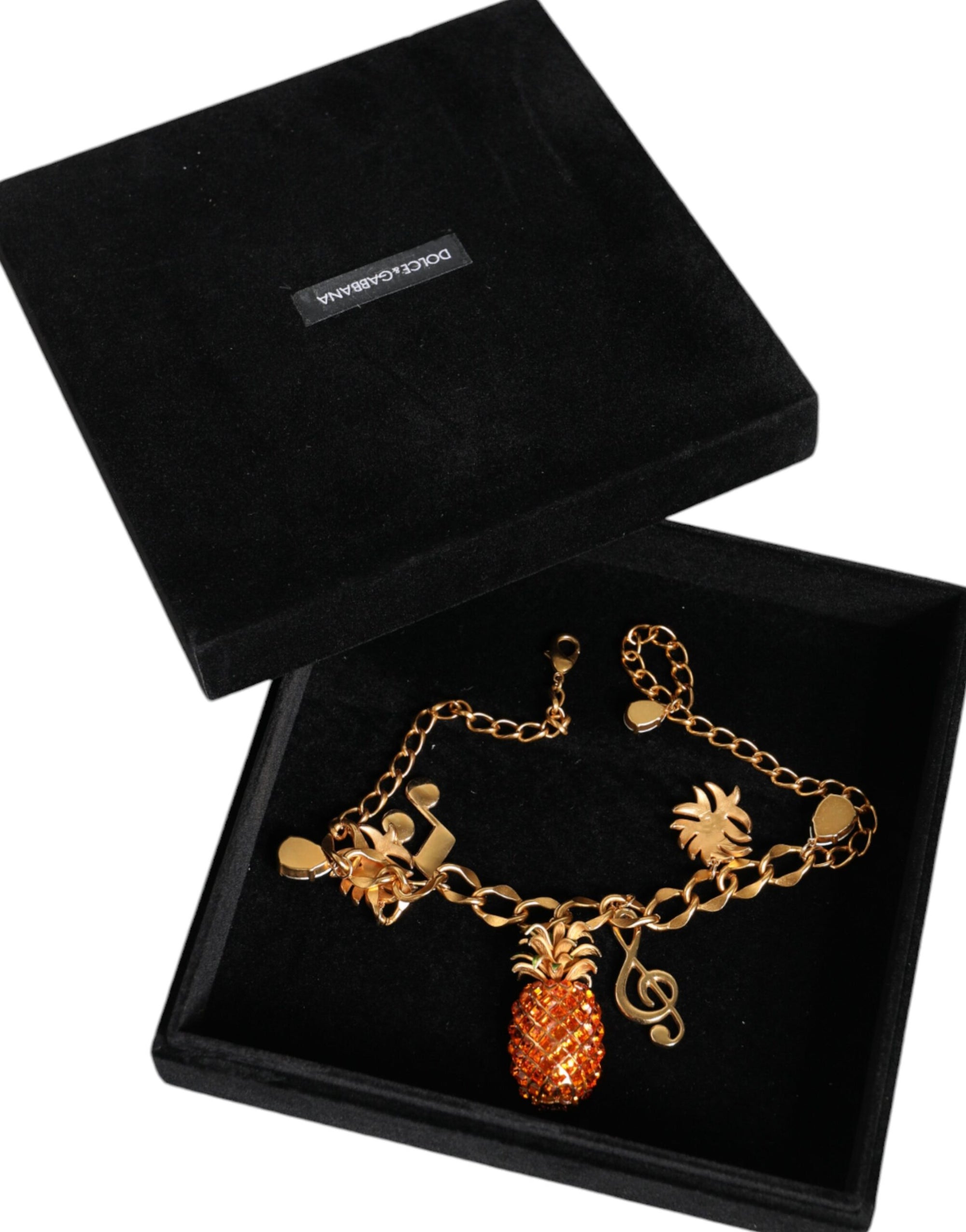 Collier musical Dolce & Gabbana en laiton doré avec chaîne et cristaux ananas