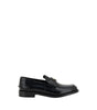 Mocassins Prada en cuir noir avec logo