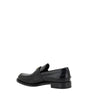 Mocassins Prada en cuir noir avec logo