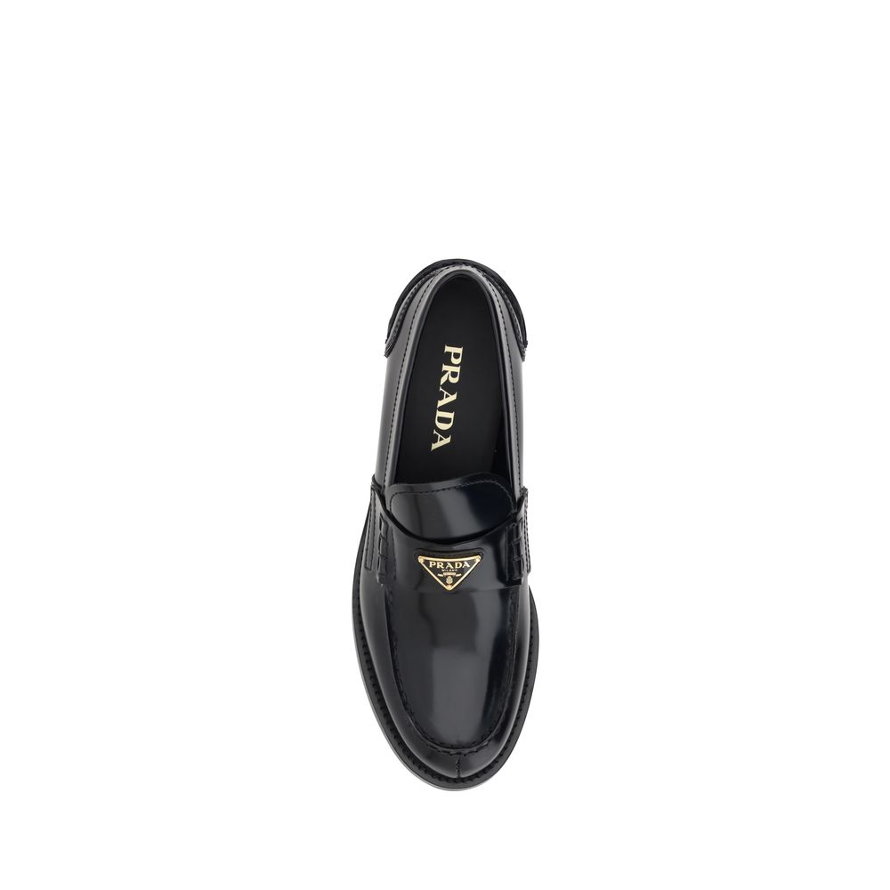 Mocassins Prada en cuir noir avec logo