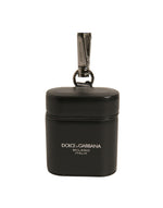 Étui pour Airpods Dolce & Gabbana en cuir noir avec logo et bracelet en métal argenté