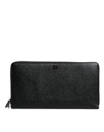 Portefeuille continental zippé Dolce &amp; Gabbana en cuir de veau noir avec logo