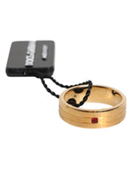 Bague Dolce &amp; Gabbana en laiton doré avec logo DG en cristal rouge