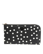 Portefeuille continental zippé Dolce & Gabbana en cuir noir et blanc à pois