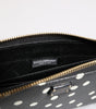 Portefeuille continental zippé Dolce & Gabbana en cuir noir et blanc à pois