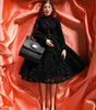 Poupées Dolce &amp; Gabbana en céramique, porcelaine, cuir et robe noire