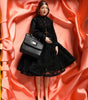 Poupées Dolce &amp; Gabbana en céramique, porcelaine, cuir et robe noire