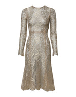 Robe ajustée et évasée à manches longues en dentelle florale dorée Dolce & Gabbana