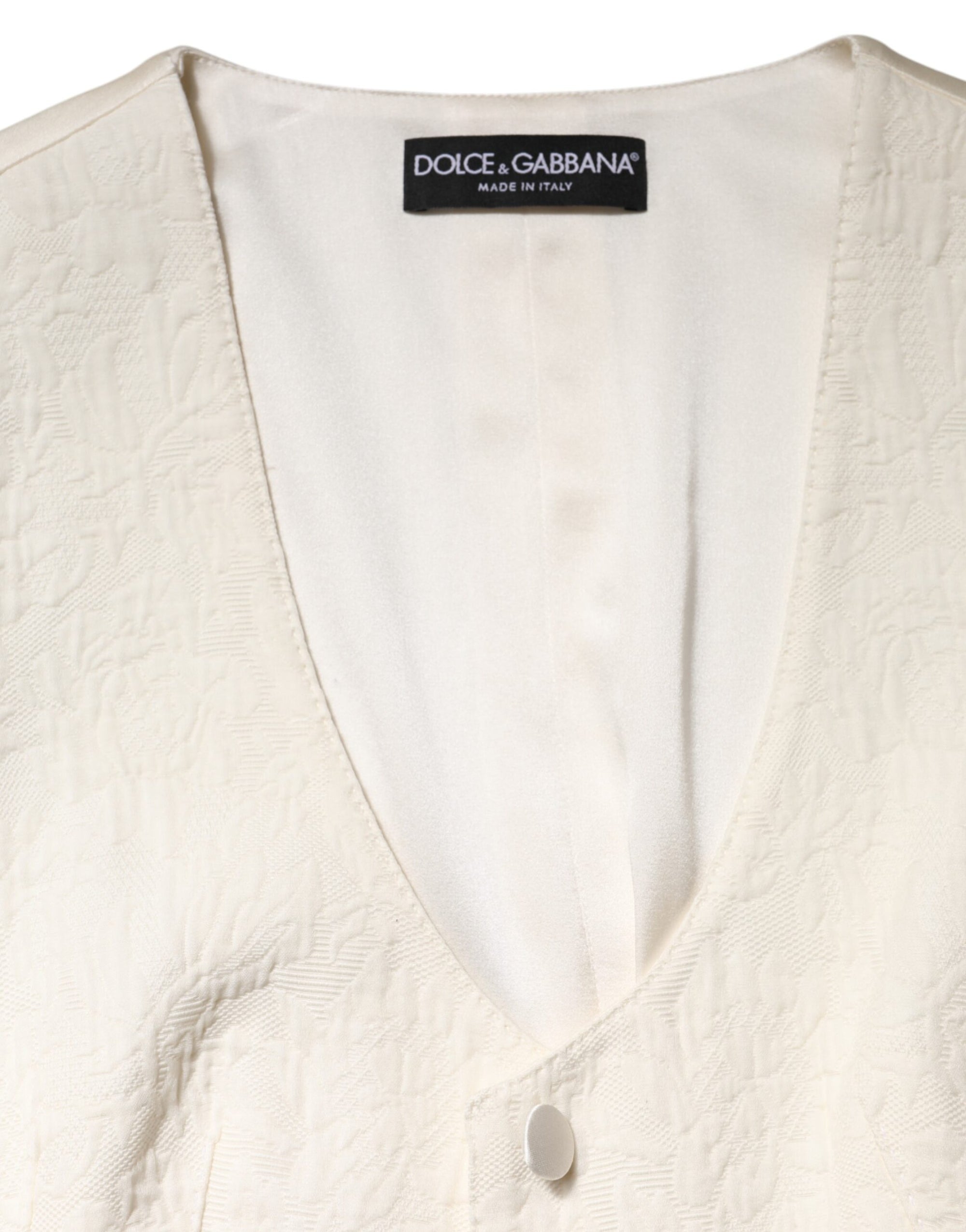 Dolce &amp; Gabbana Débardeur boutonné sans manches en coton ivoire