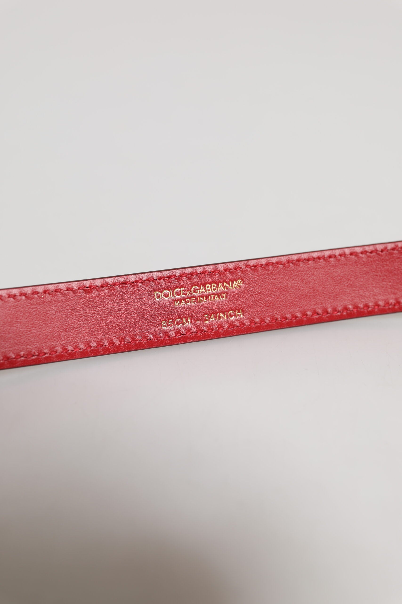 Ceinture à boucle en métal gravée du logo rouge Dolce &amp; Gabbana