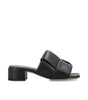 Mules à patchs Bottega Veneta