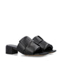 Mules à patchs Bottega Veneta
