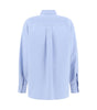 Camisa Brunello Cucinelli con icónico detalle joya