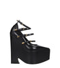 Broche en cuir noir Versace