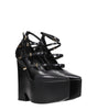 Broche en cuir noir Versace