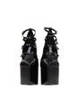 Broche en cuir noir Versace