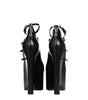 Broche en cuir noir Versace