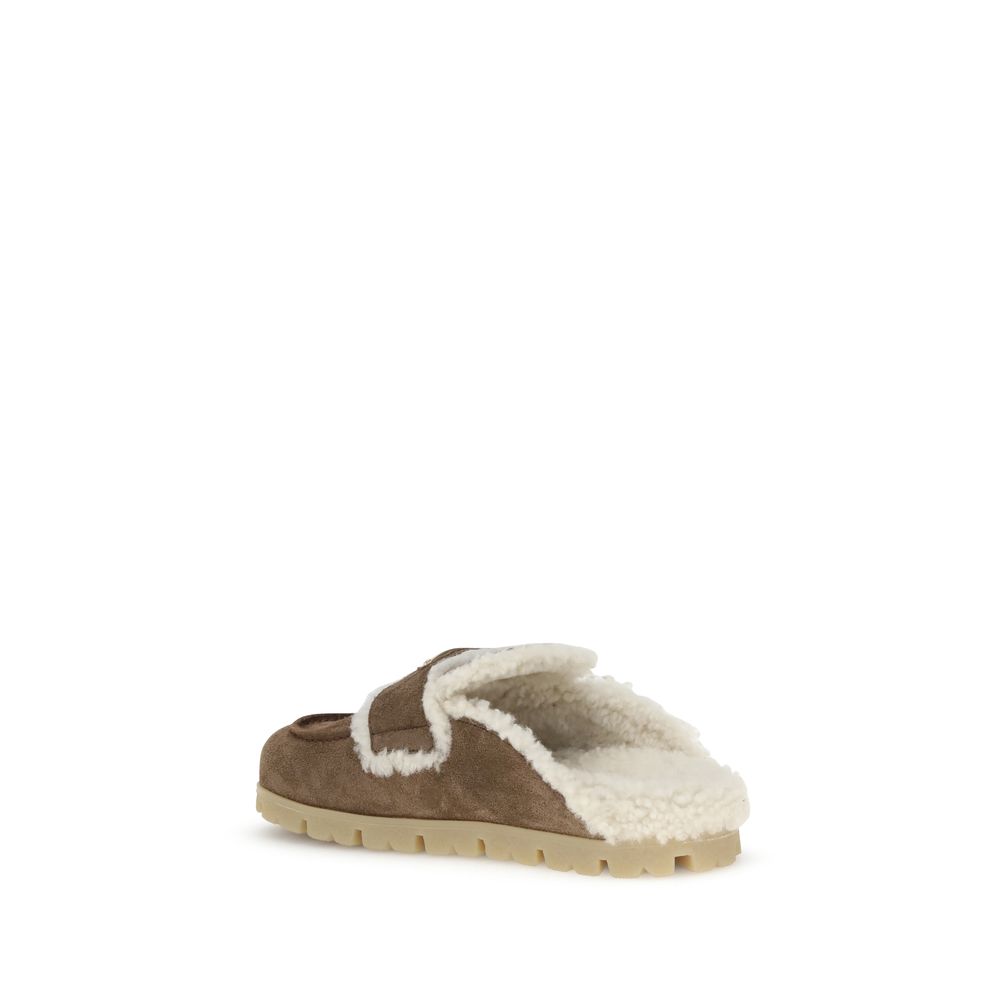 Mules en fourrure Prada