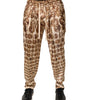 Pantalon de jogging en sergé de soie beige à imprimé pièces de monnaie Dolce &amp; Gabbana pour homme