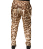 Pantalon de jogging en sergé de soie beige à imprimé pièces de monnaie Dolce &amp; Gabbana pour homme